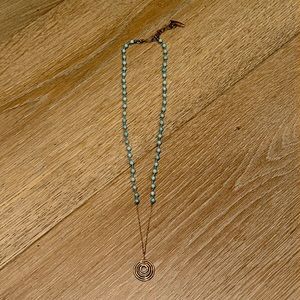 wendy mink blue gemstone necklace with circular pendant
